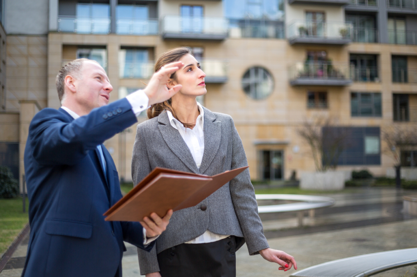 Real estate agent presenting new apartment